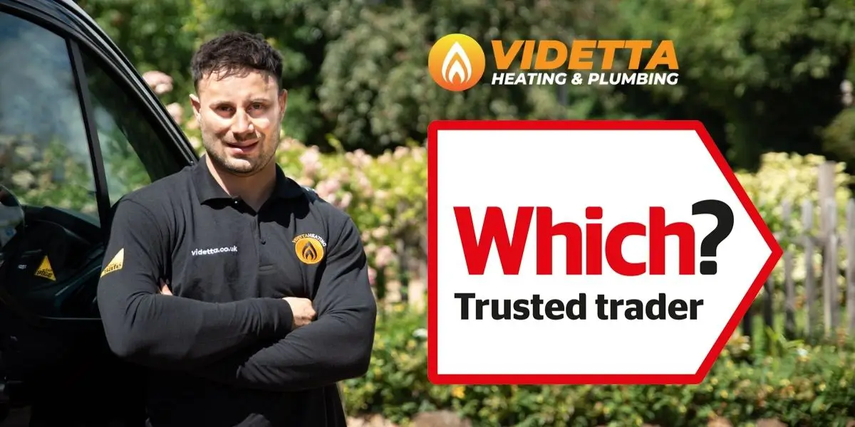 man with which trusted trader logo