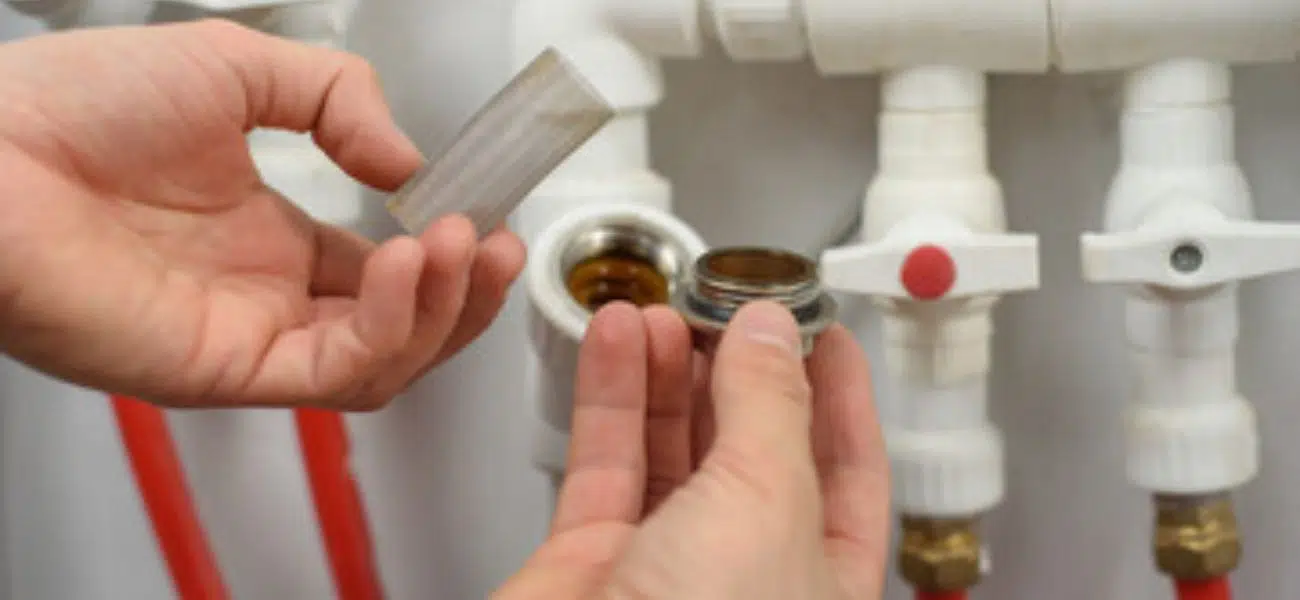 hands holding pipe filters